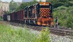 WE 7013 now shoves the empties back through town.